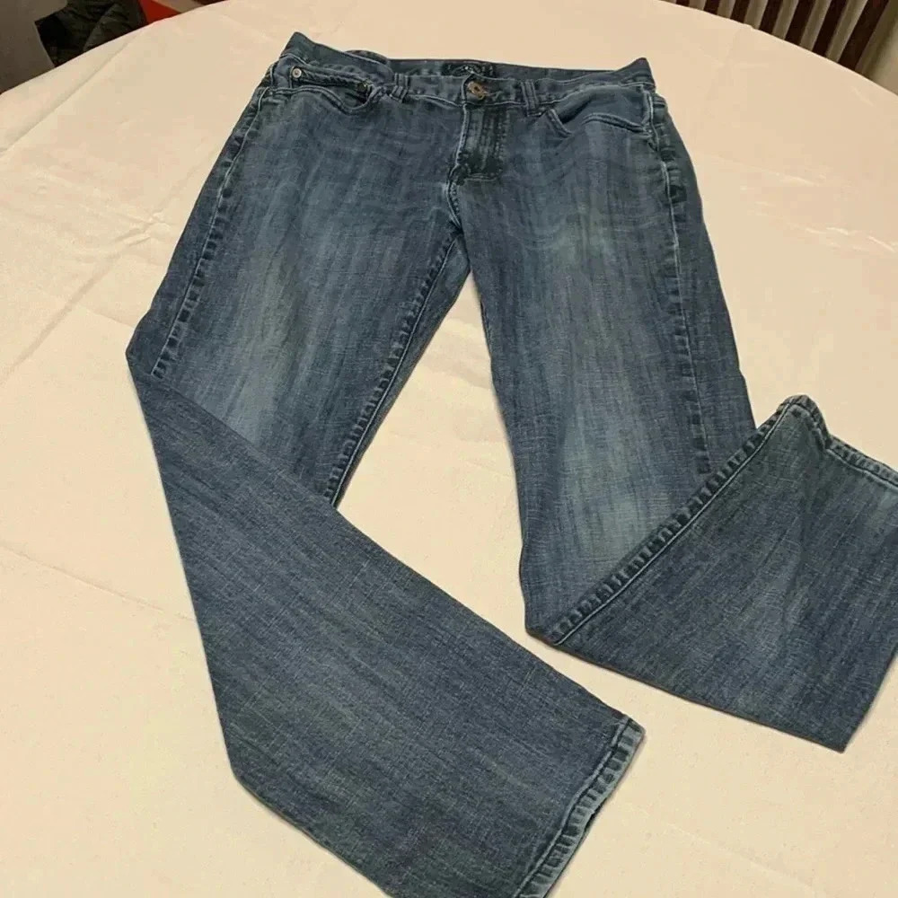 Lucky Brand Woman’s jeans, Size 32 waist. Length is 32.